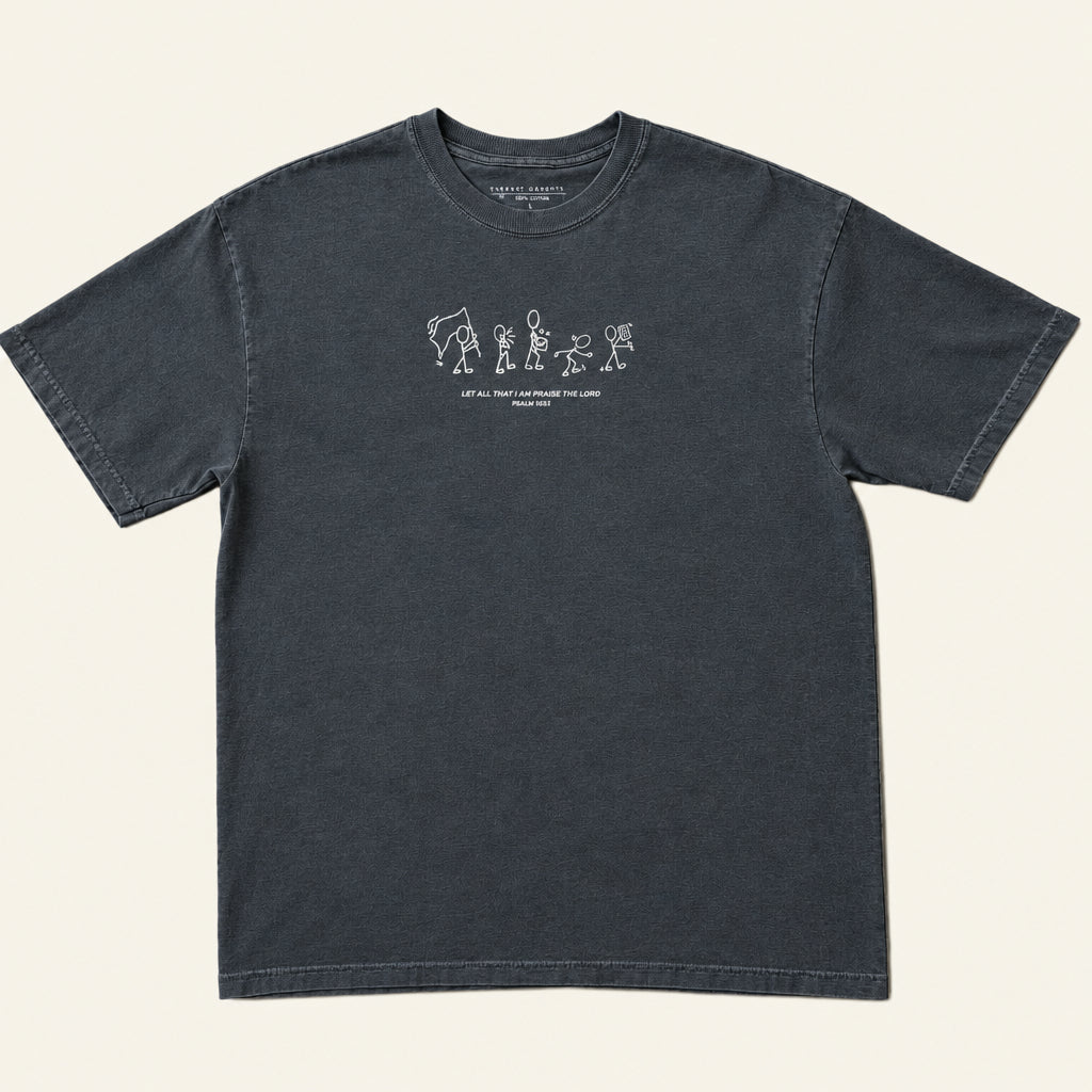 A dark charcoal gray short-sleeve t-shirt with a small white graphic print on the chest, laid flat on an ivory background.